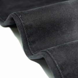 ZZ1252 Sostenible 22.3% Tela de mezclilla negra de poliéster reciclado para jeans