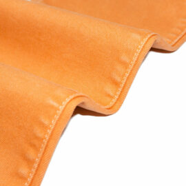 ZZ0029-S Tejido de jeans de color naranja de tinte liso Tejidos de mezclilla de calidad superior